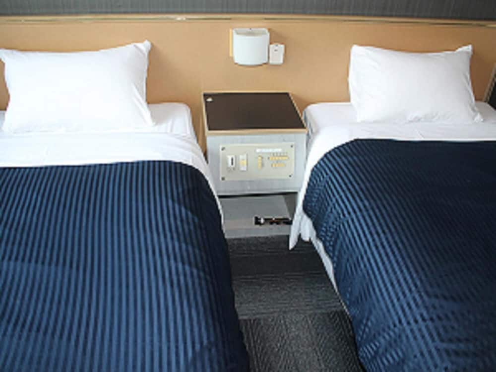 Фото Hotel Livemax Budget Namba