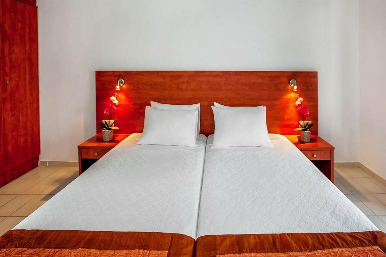 Фото Xenios Dolphin Beach Hotel