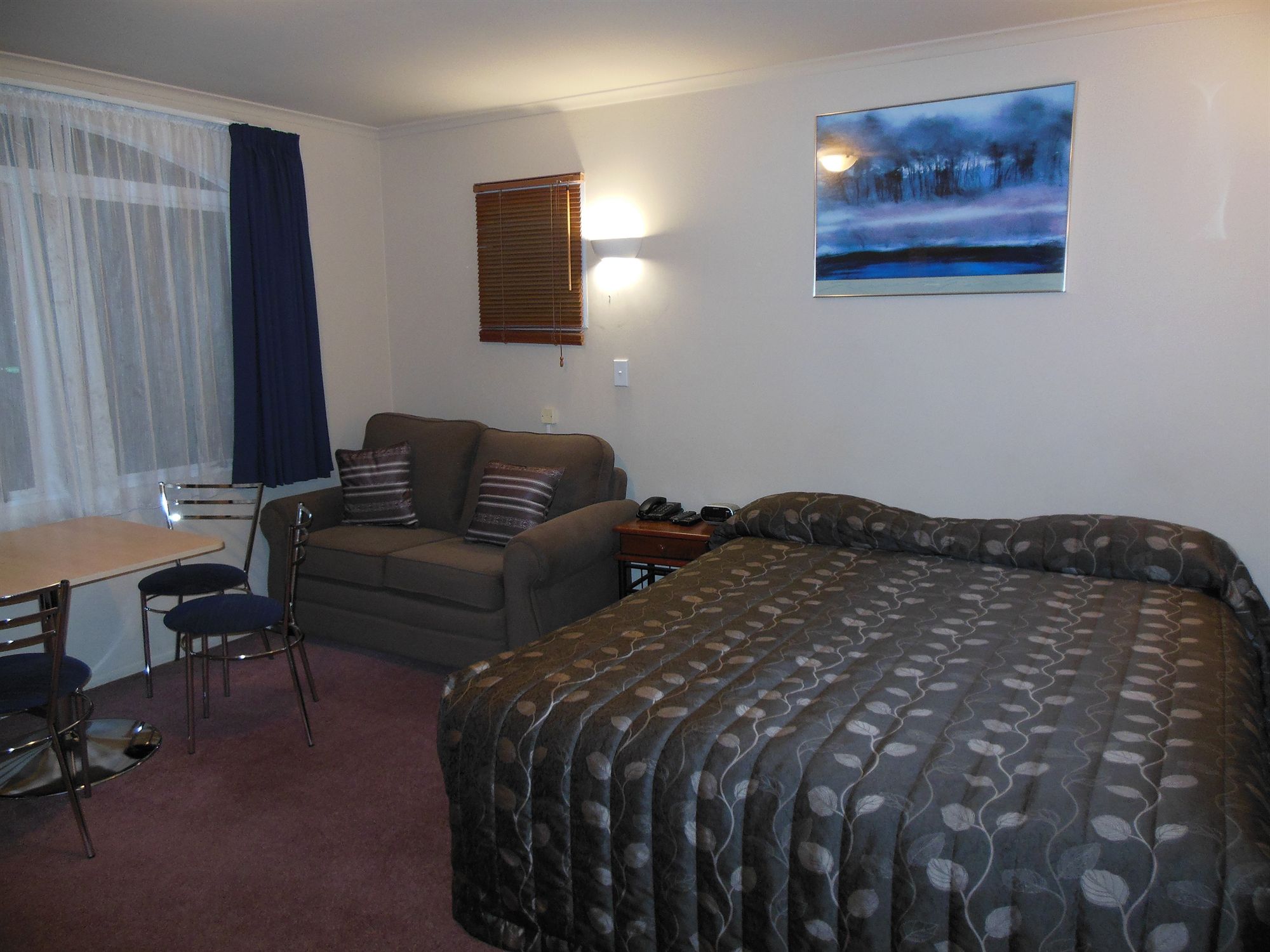 Фото Asure Camelot Arms Motor Lodge