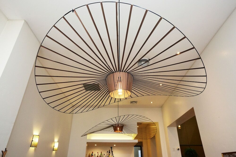 Фото L'Adresse Hotel Boutique