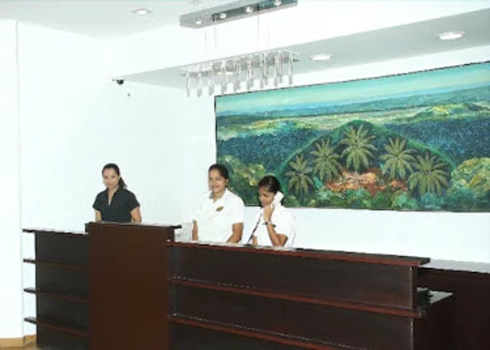 Фото Whispering Palms Beach Resort