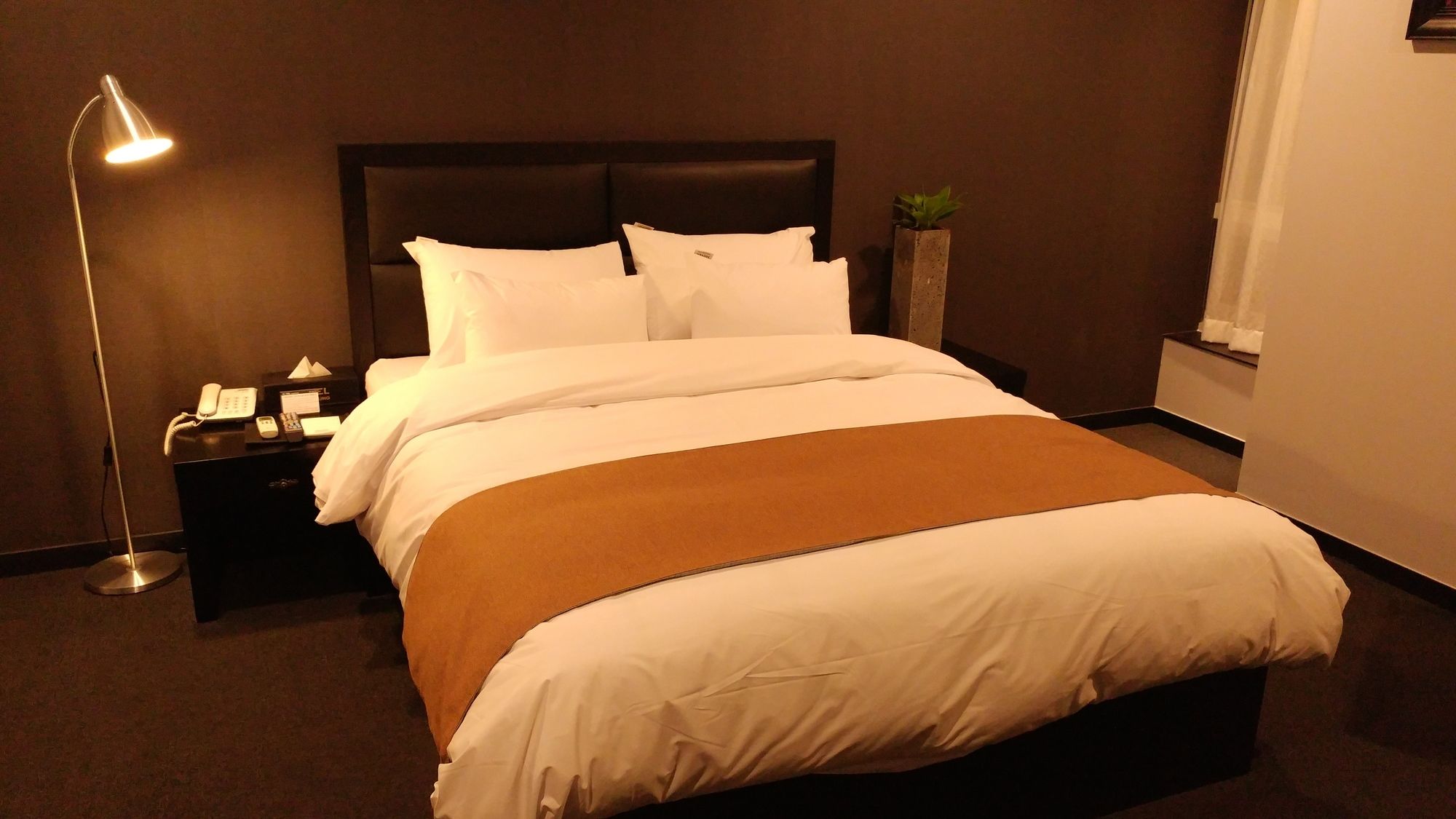 Фото Gangneung Tourist Hotel