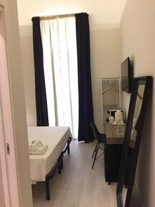 Гостиница Gatto Bianco House