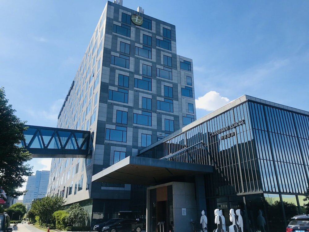 Фото Langham Place Ningbo
