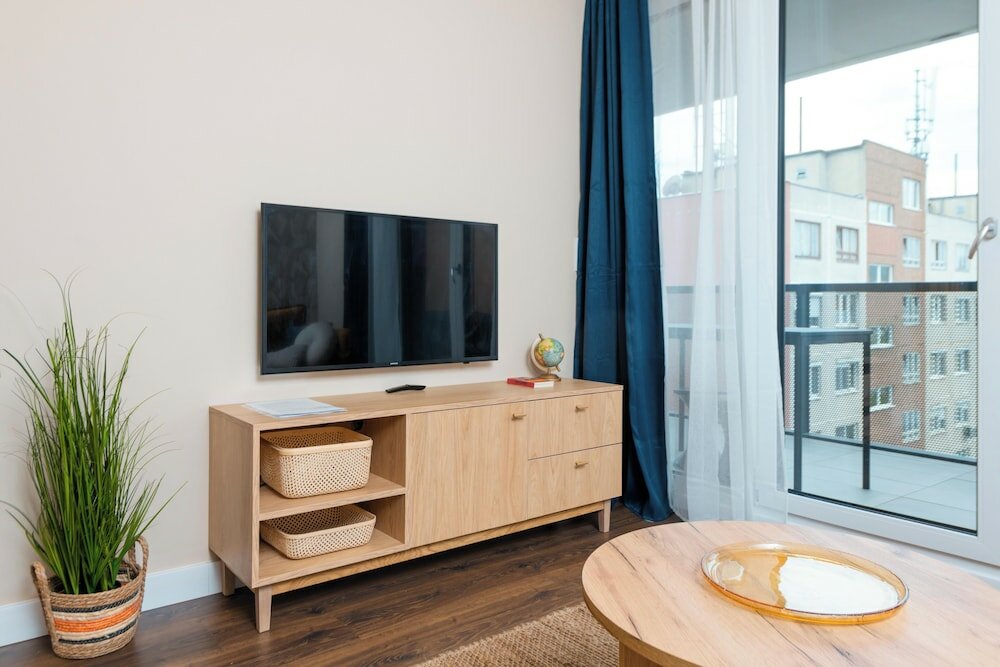 Фото WaterFront City Apartments by UrbanRent