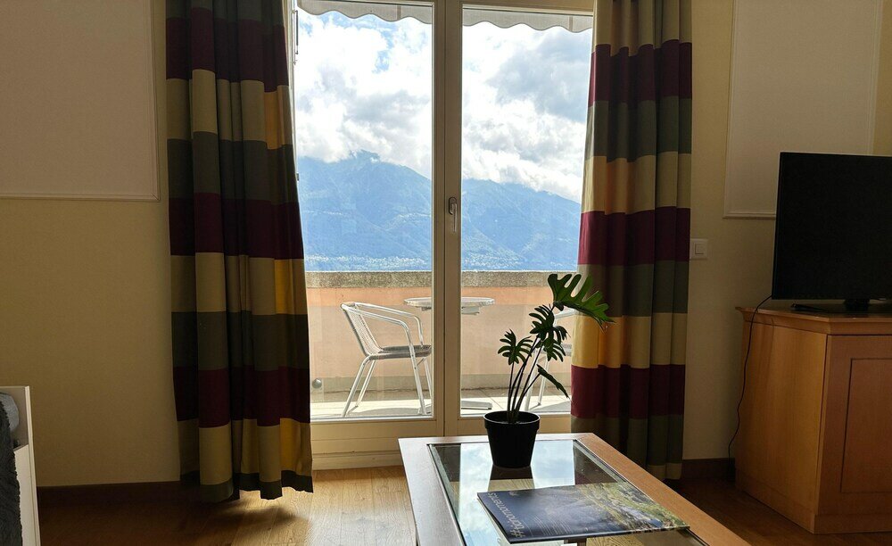 Фото Erooms Minusio