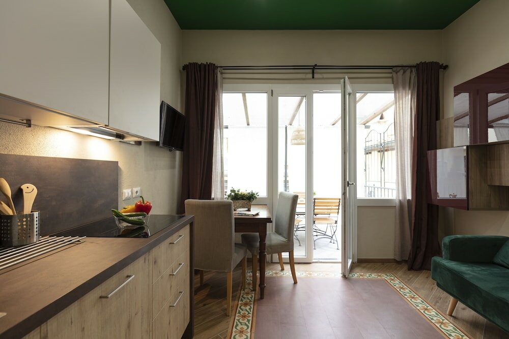 Фото Roommo Apartments