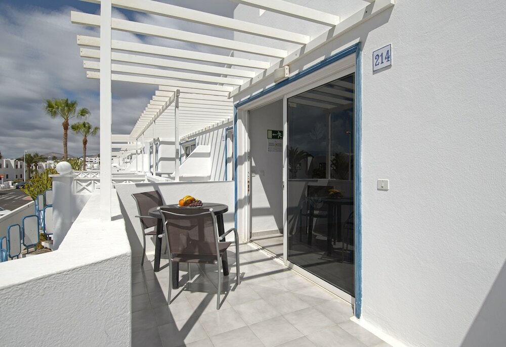 Фото Apartamentos Livvo Oasis