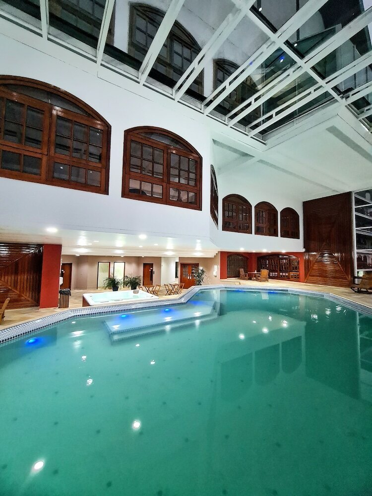 Фото Dúplex Luxo com Piscina Aquecida, Lareira e Wifi