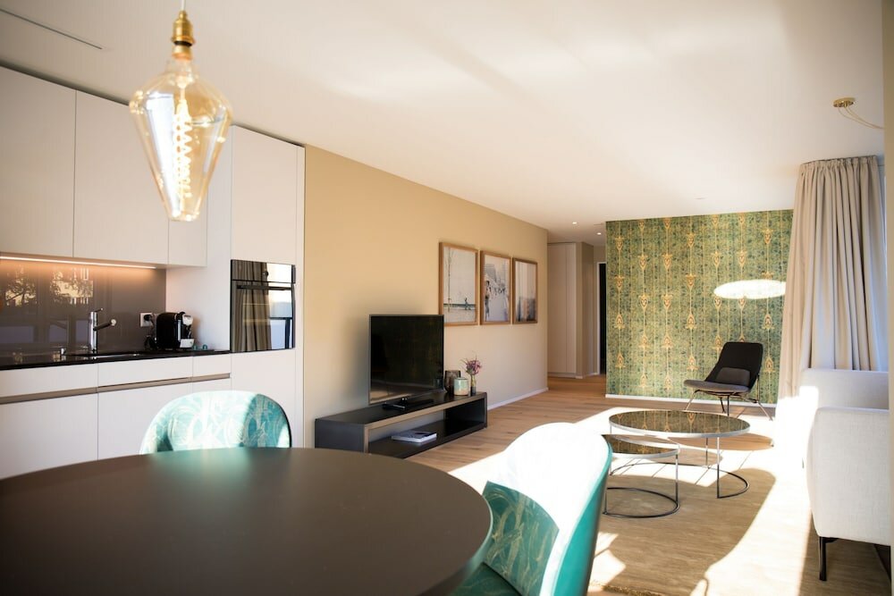 Фото Gubelhof Suites