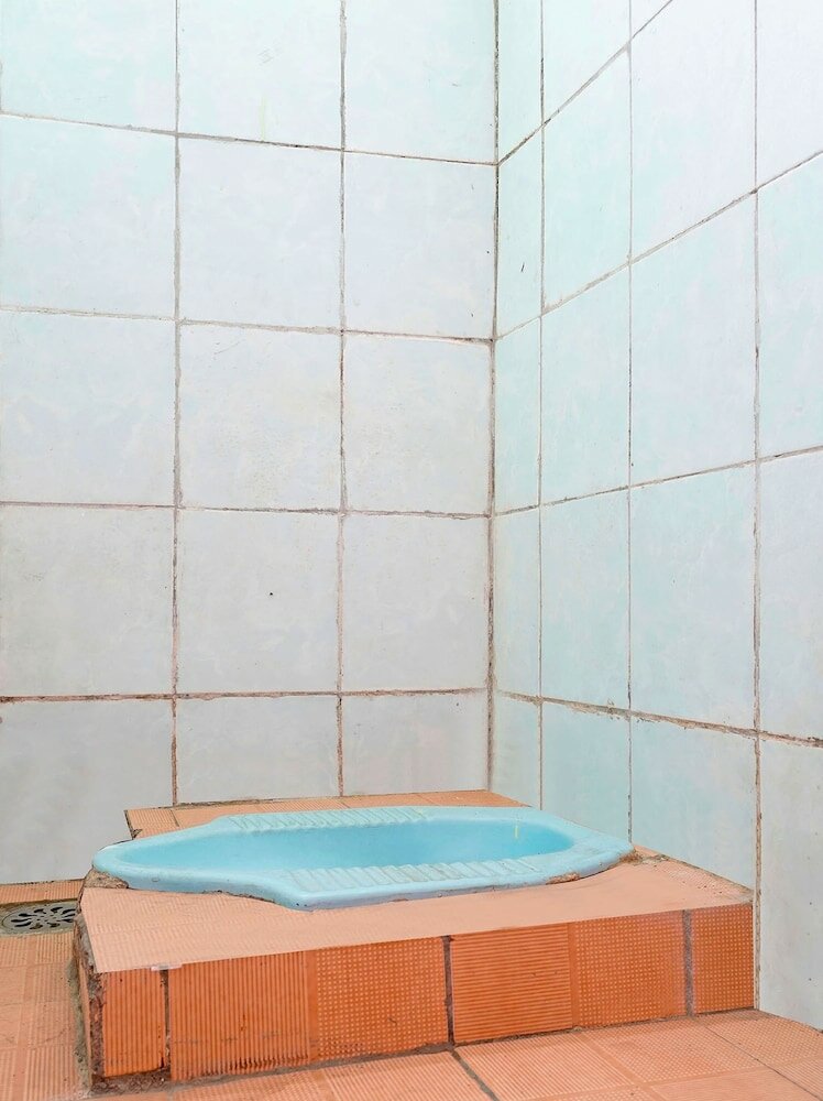 Фото Spot On 91783 Urban Syariah Residence