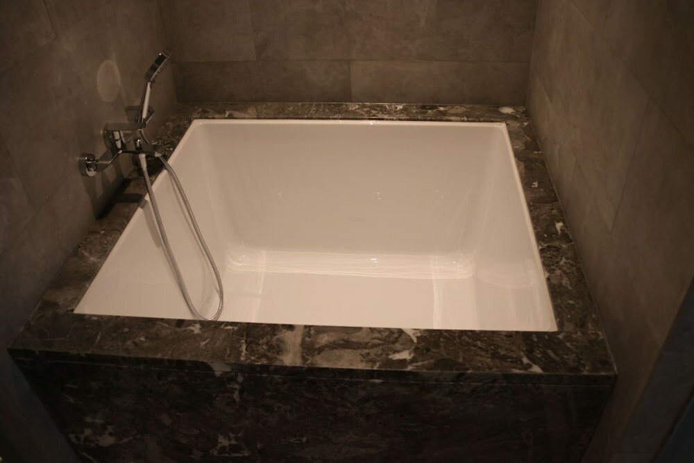 Фото Ln Dongfang Hotel Pazhou