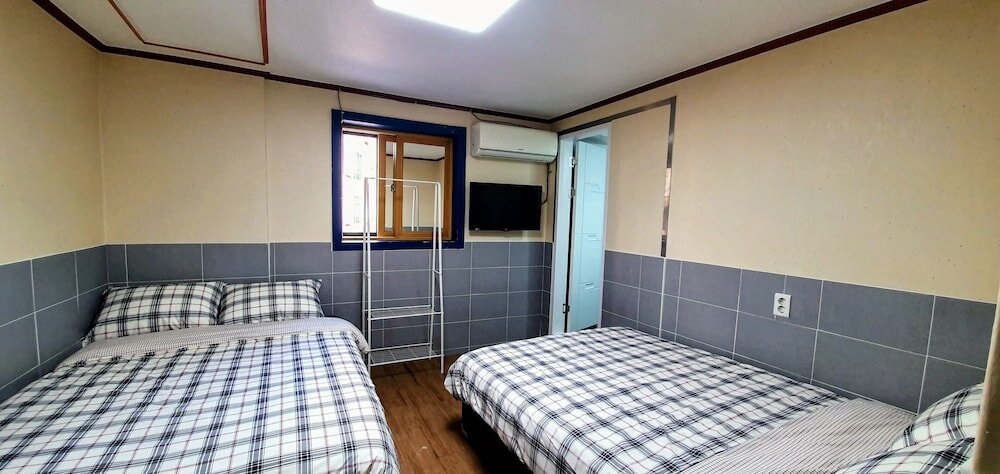 Фото New Sun Guesthouse Myeongdong