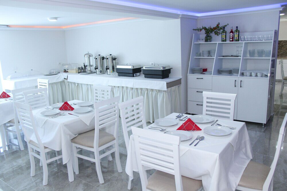 Фото Atlantis Hotel & Apartments