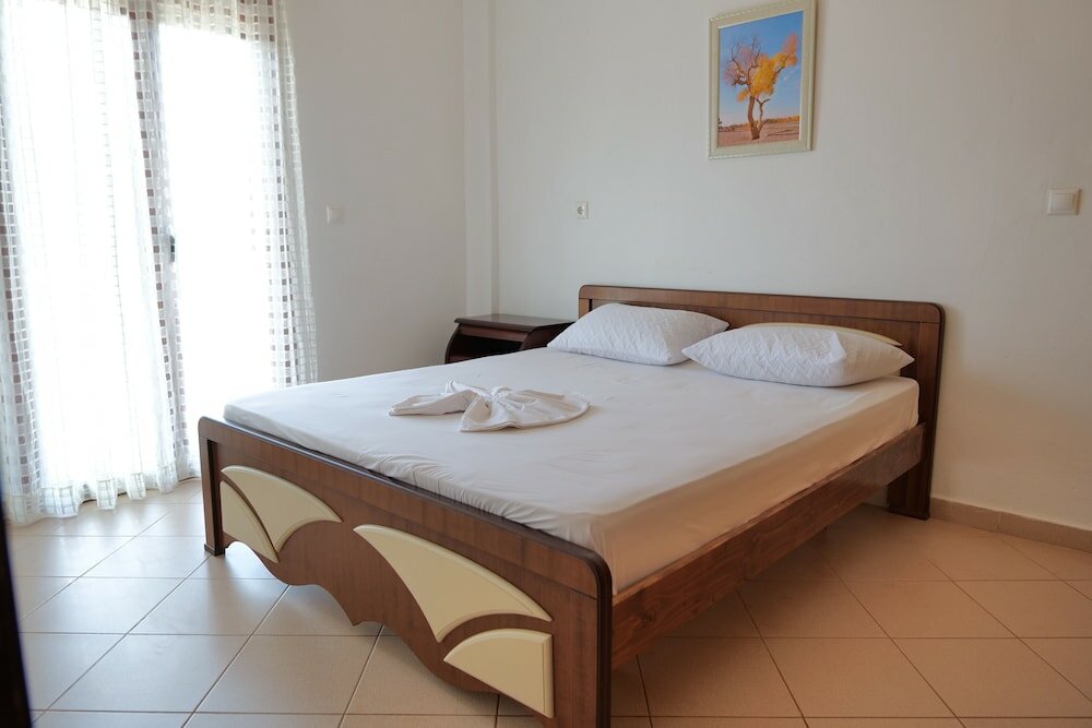 Фото Pellumb Apartments