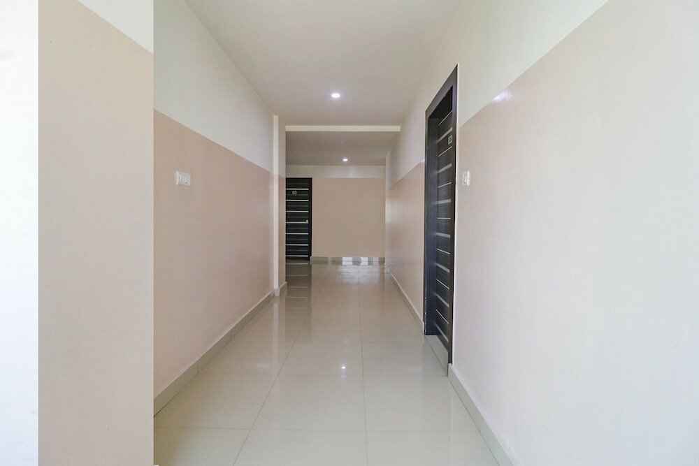 Фото Fabhotel Champion Residency