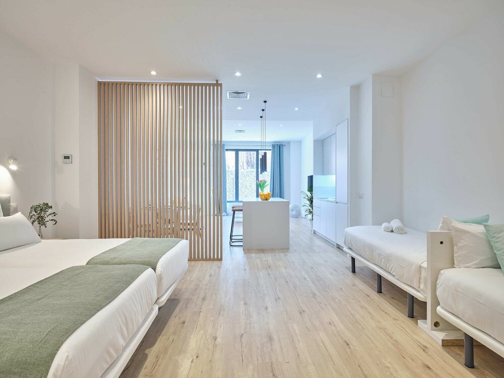 Фото Paseo Suites Hotel