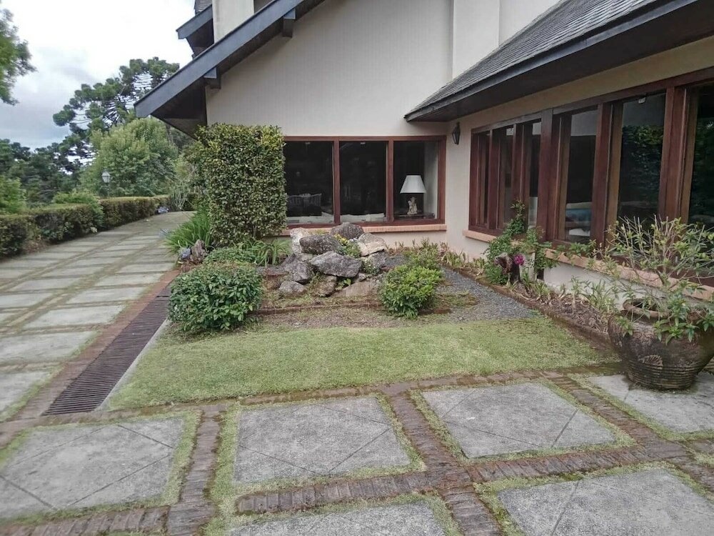 Фото Aconchegante Mansão em Campos do Jordão