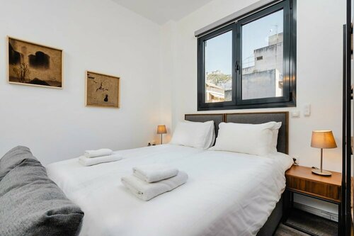 Гостиница Sanders Home Suites - Cheerful Downtown Studio в Афинах