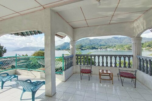 Гостиница Oyo 92503 Penginapan & Villa Sirait