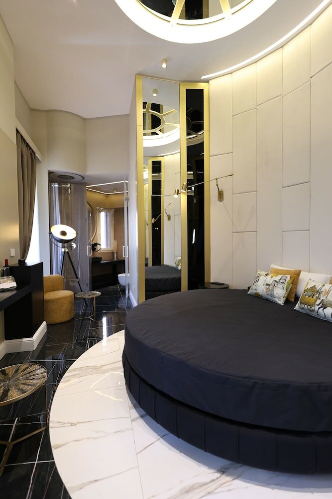 Фото Maison San Carlo Luxury Suites