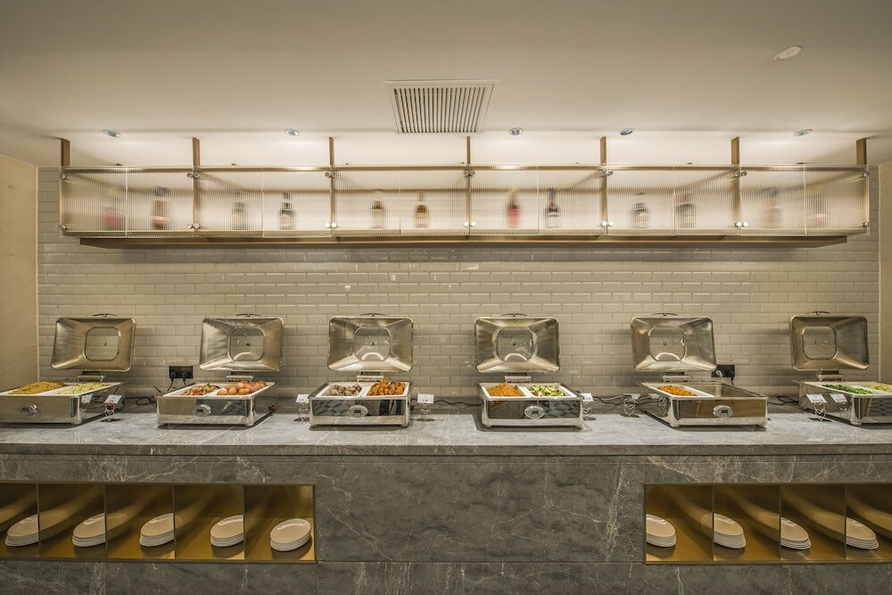 Фото Gz Baiyun Airport MeHood Liz Hotel T1