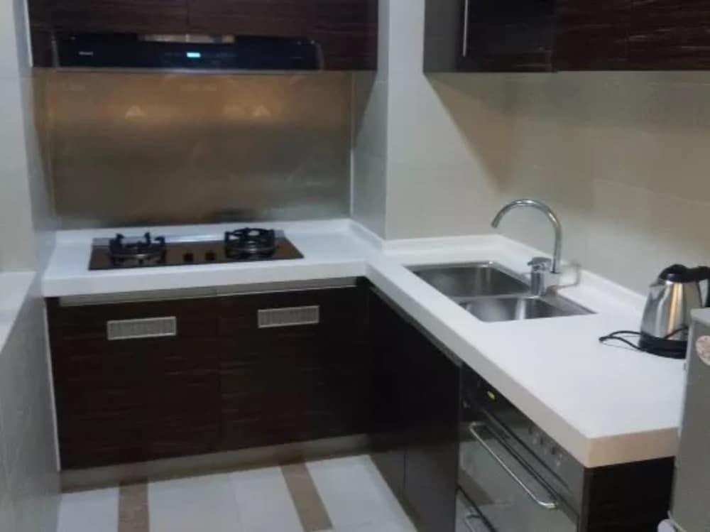 Фото Yumi Apartment-Quan Tian Xia Branch