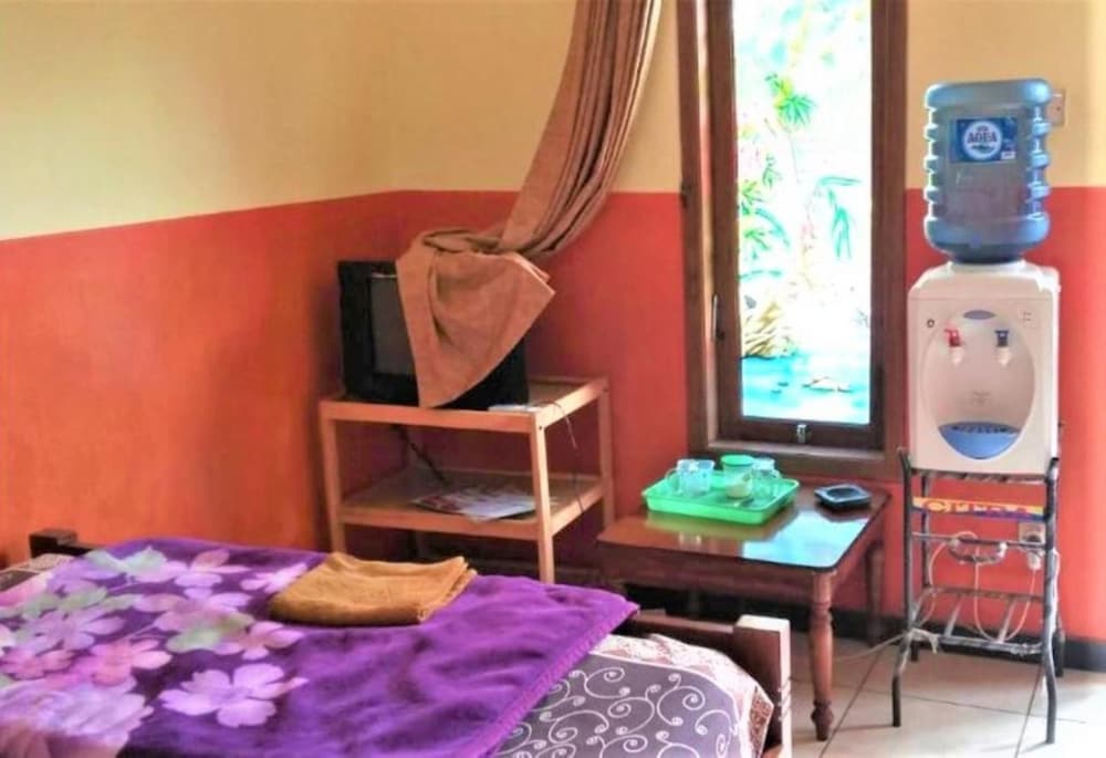 Фото Penginapan Rezeki