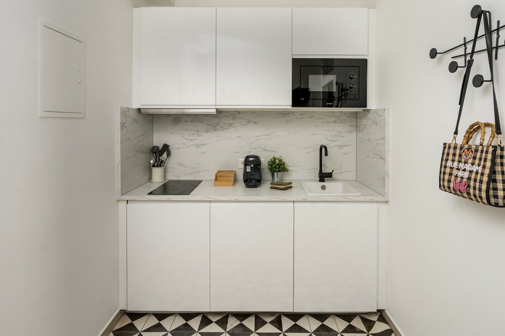 Фото Pappagallo Apartments