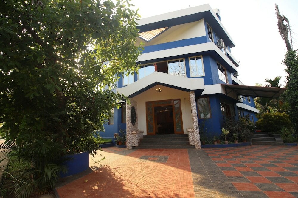 Фото Oyo 39345 Chrisander's Resort