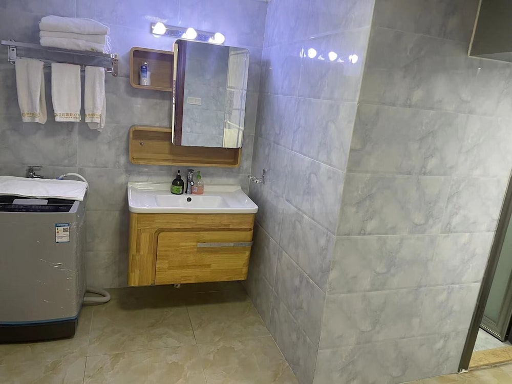 Фото Yoyo International Apartment