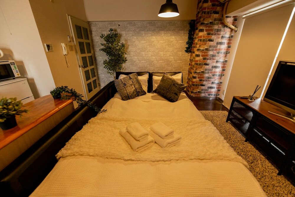 Фото Shinsaibashi Midtown Apartments