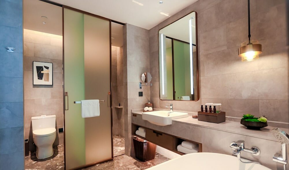 Фото Ln Dongfang Hotel Pazhou