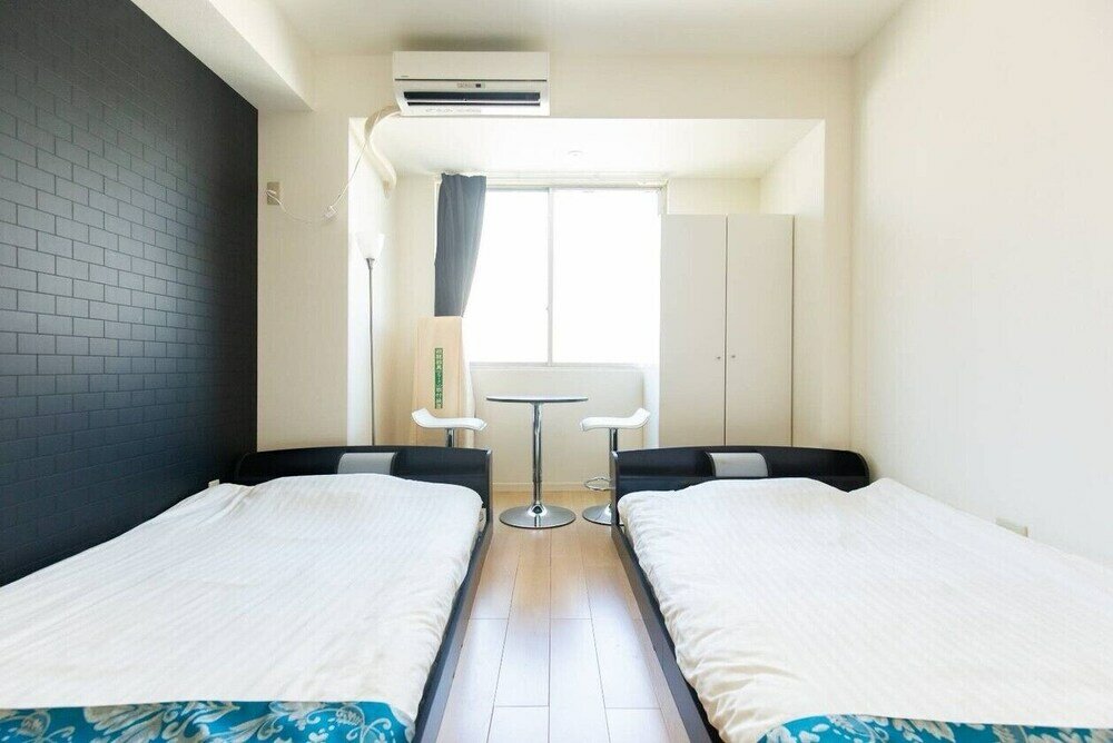 Фото Guesthouse Daikokucho Ekimae