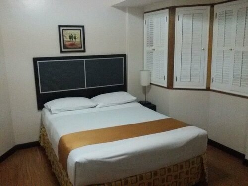 Гостиница Ralph Anthony Suites в Маниле