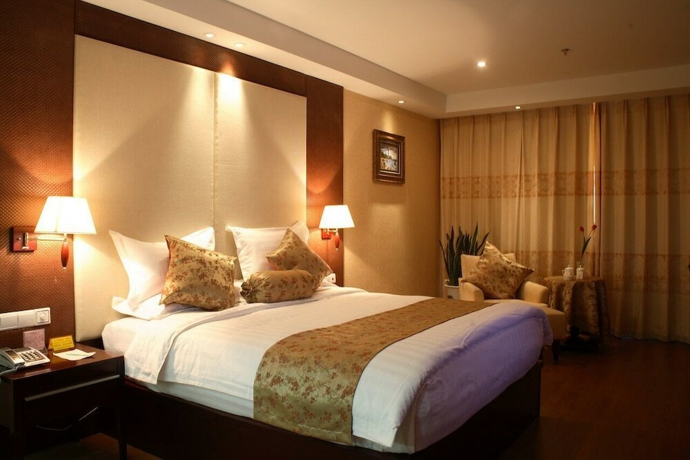 Фото Qingdao Qiulin Hotel