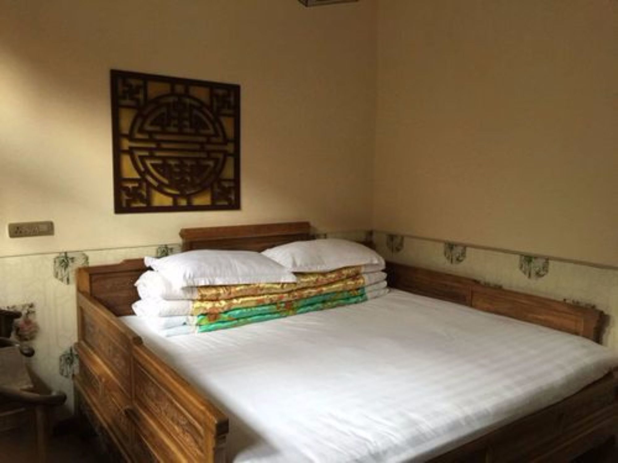 Фото Pingyao Hongyuyuan Inn