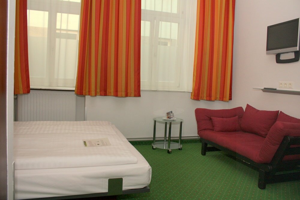 Фото Pension Stadthalle