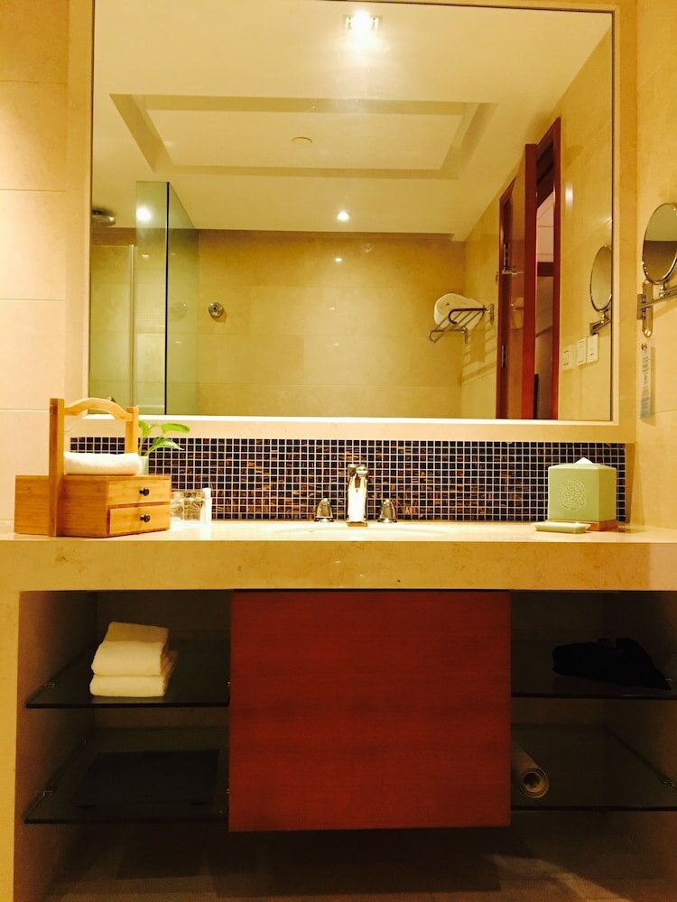 Фото Grand New Century Hotel Ninghai Jinhai