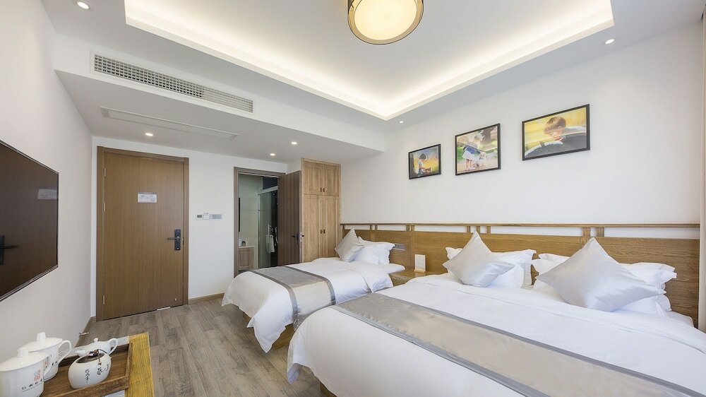 Фото Floral Hotel Red Forest Yuyao