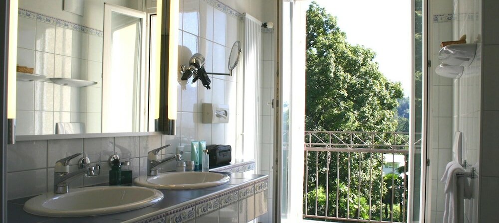 Фото E-Rooms Minusio