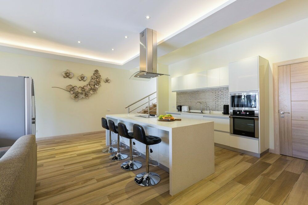 Фото Вилла с 4 Спальнями на Курорте с Пляжным Клубом и Консьерж-Сервисом