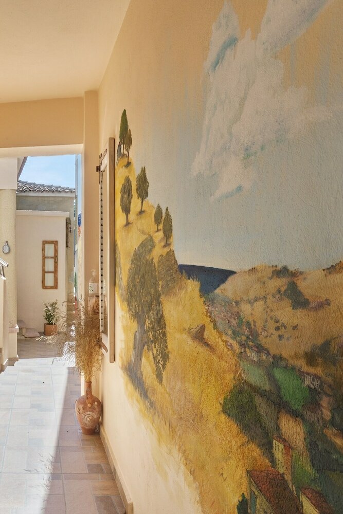 Фото Eressian Lodgings Apartments