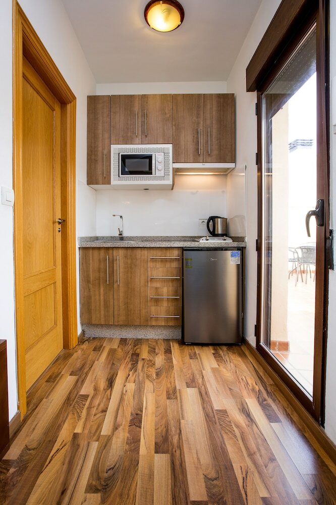 Фото Apartamentos Casa de la Lonja