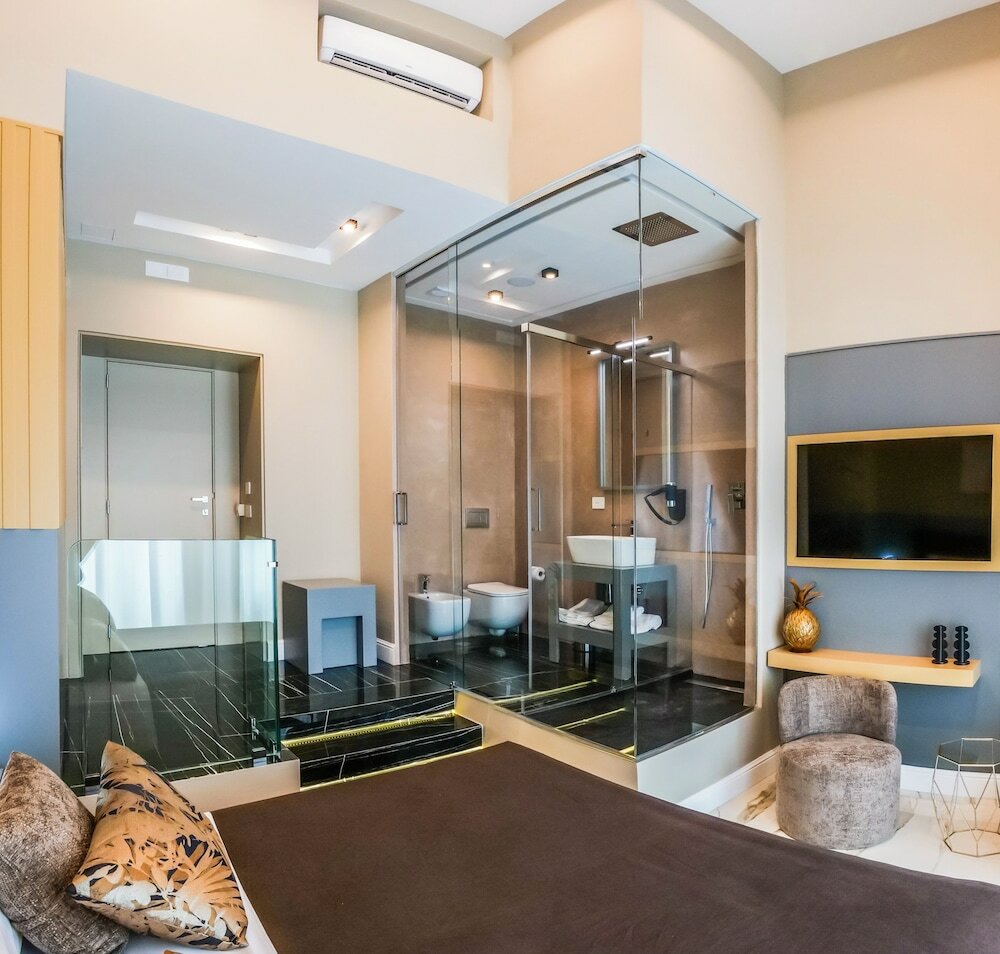 Фото Maison San Carlo Luxury Suites