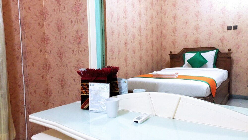 Фото Simply Homy Guest House Unit Bintaran