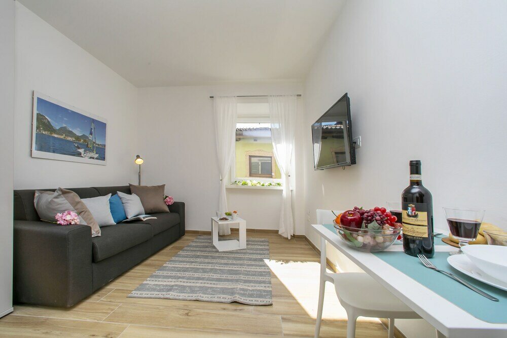 Фото Nido sui Tetti di Riva del Garda