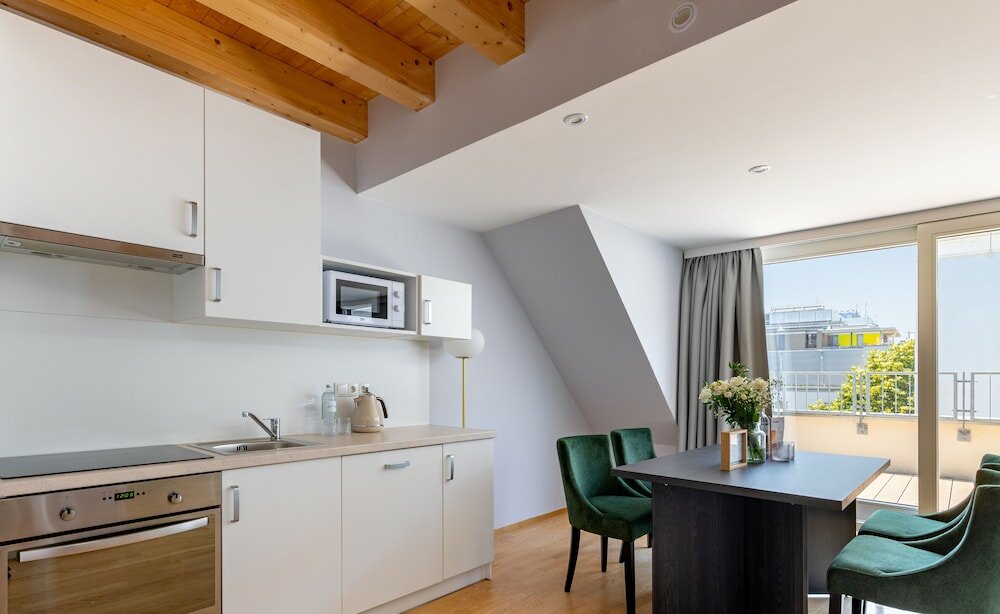 Фото Numa i Strauss Rooms & Apartments