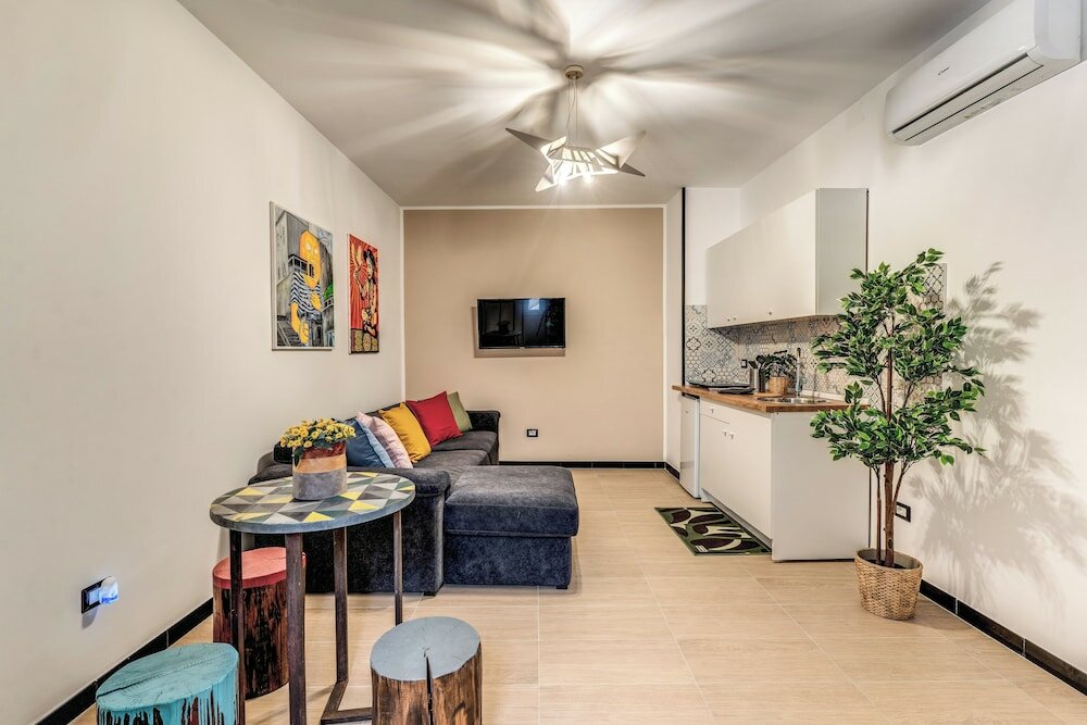 Фото The Quarters Naples Apartment