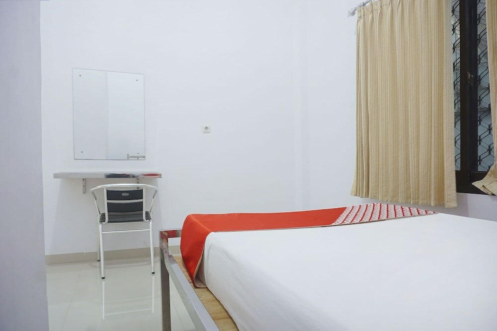 Фото Oyo 3123 Orchid Homestay Syariah